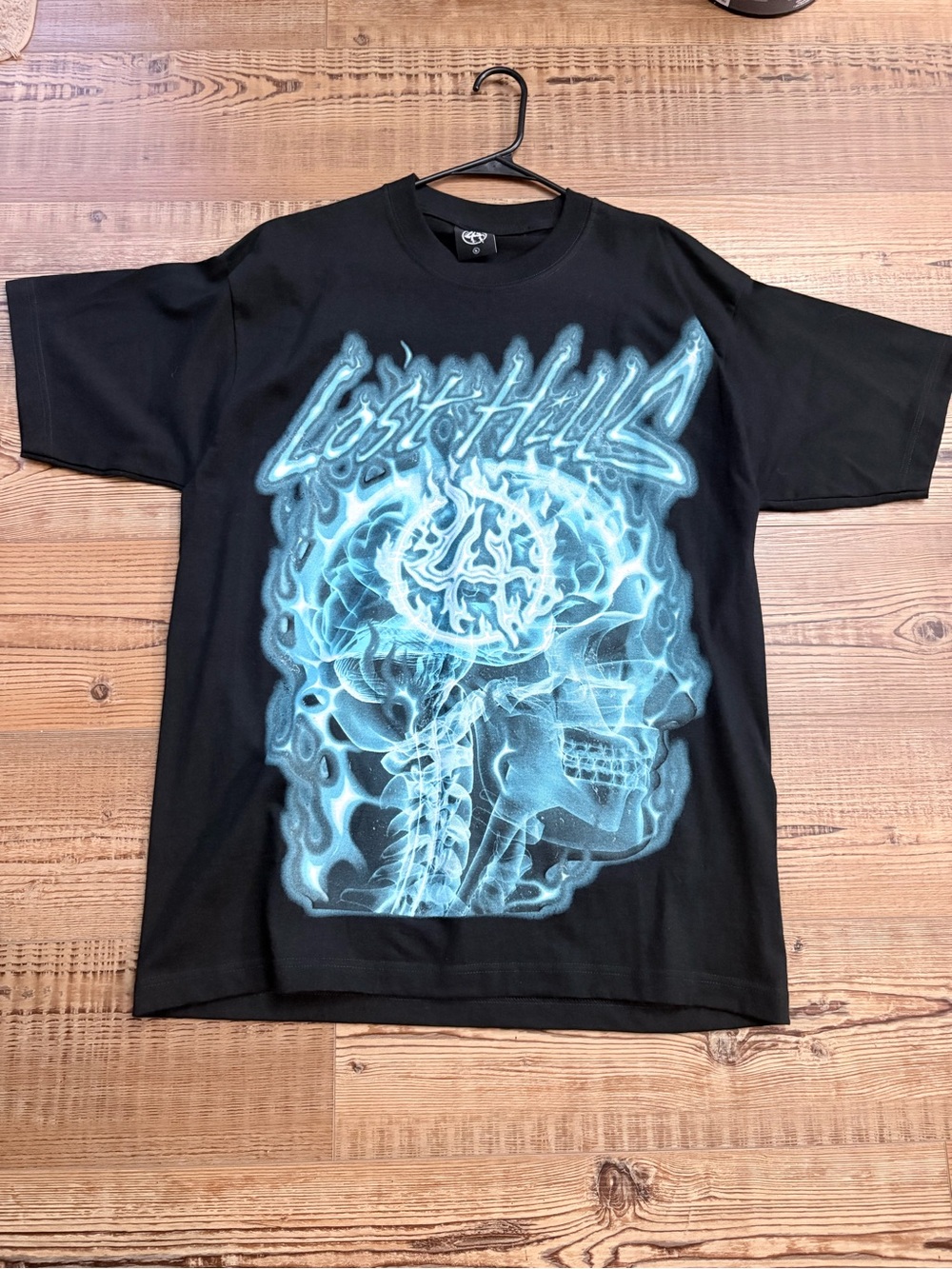 Black Short-Sleeve Tee with Blue X-Ray Skull Graphic